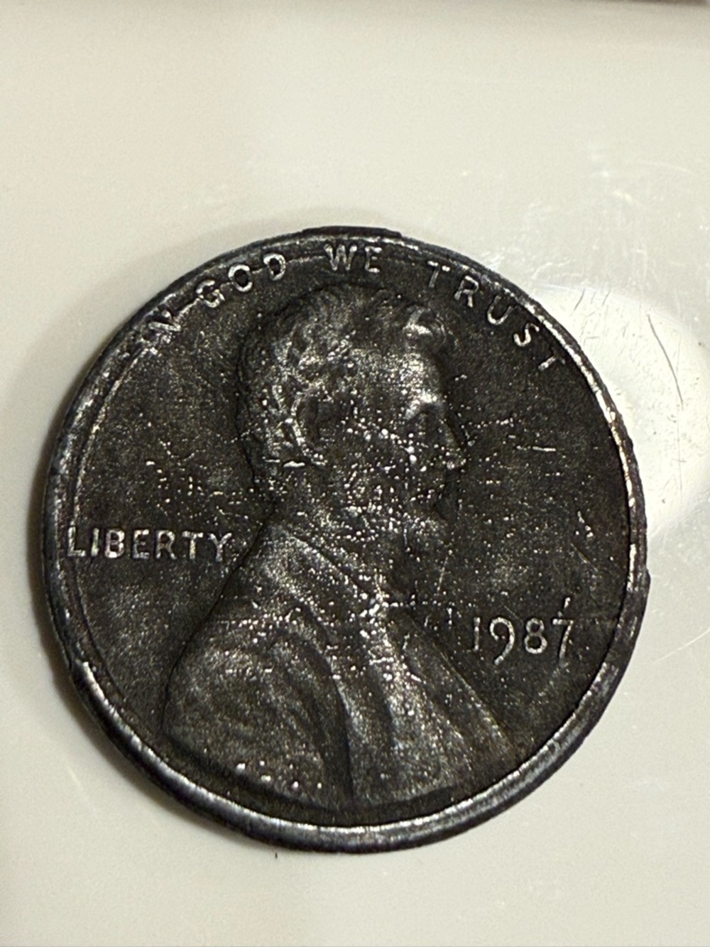 1987 Lincoln Penny — Error Penny in that it was not dipped for copper coating.